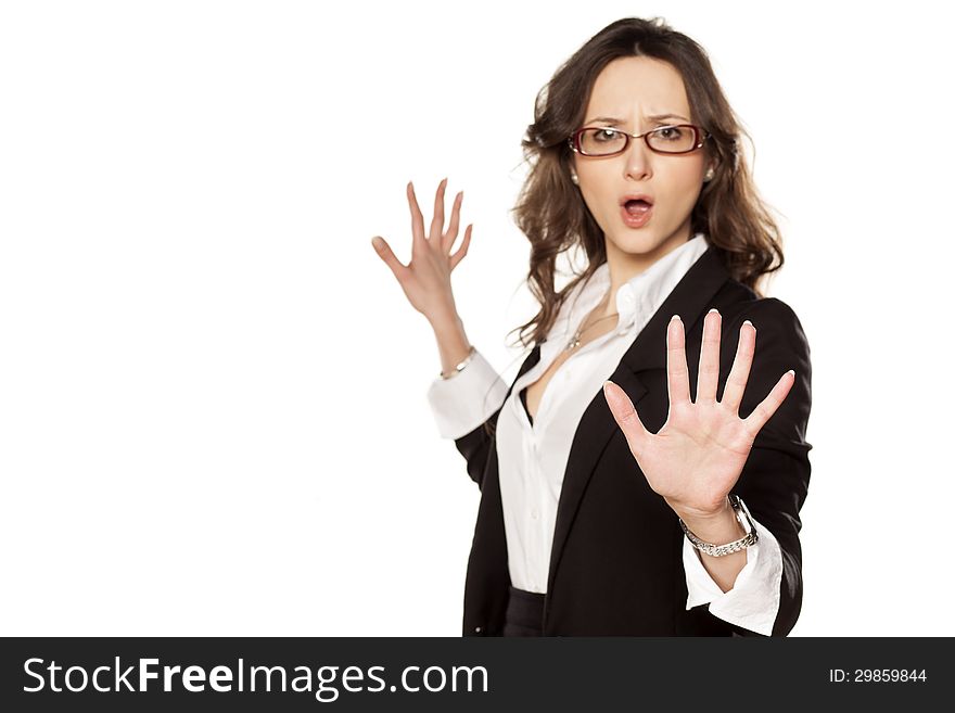 Nice screaming business woman with stop placed hand. Nice screaming business woman with stop placed hand