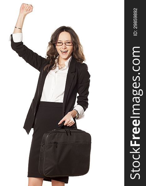 Nice business woman with laptop bag exulting with a hand up. Nice business woman with laptop bag exulting with a hand up