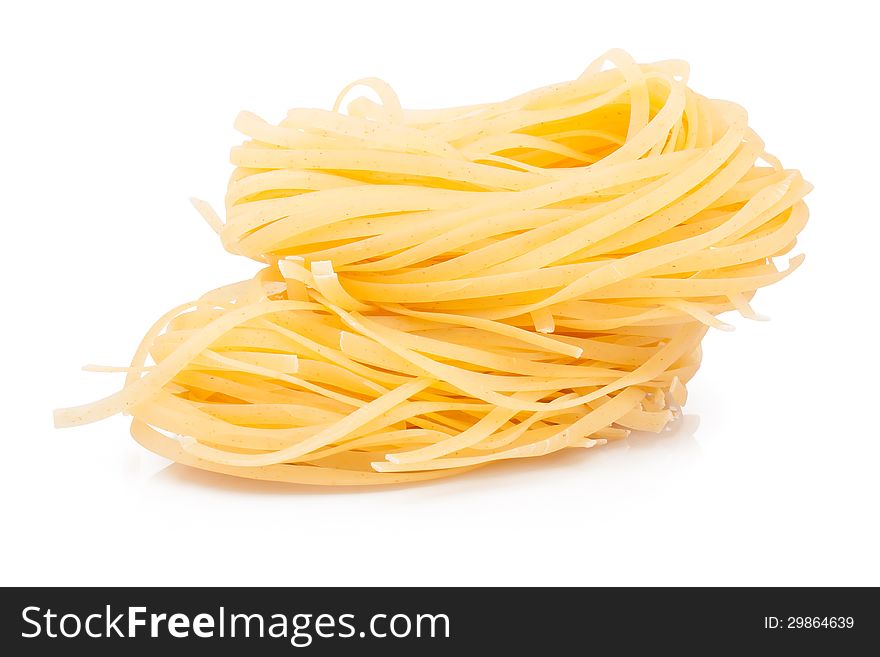 Italian pasta nest on white background, food ingredients