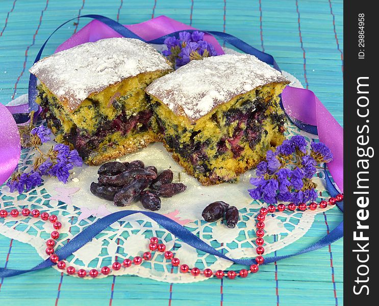 Home pie with fresh berries on the blue background. Home pie with fresh berries on the blue background