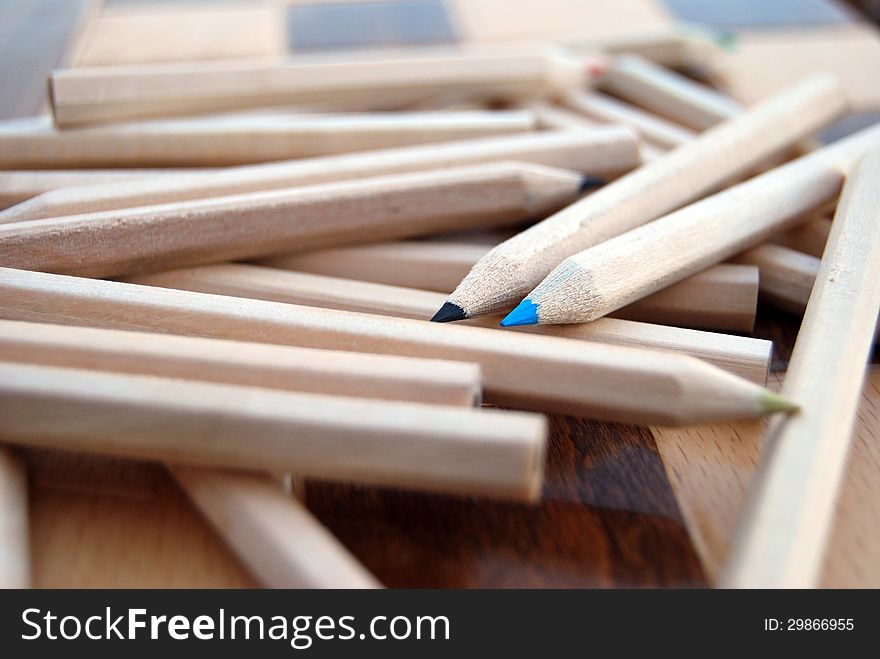 Closeup photograph of a pile of crayons