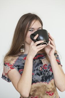 Young Woman With Beautiful Green Eyes With Black Coffee Cup Royalty Free Stock Photography