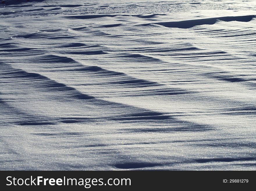 Textural Background In The Form Of A Snow Field