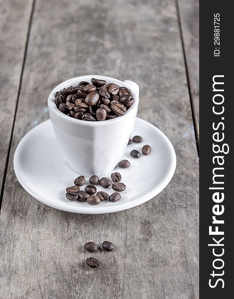 Coffee beans in espresso cup