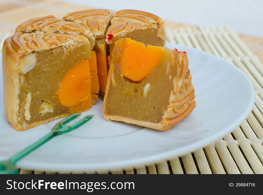 Famous moon cake with assorted nuts and yolk. Famous moon cake with assorted nuts and yolk