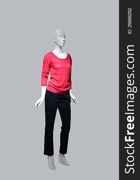 Fashion dummy with red sweater and black pants