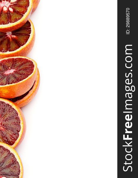 Halves of Perfect Ripe Blood Oranges as Frame closeup on white background. Halves of Perfect Ripe Blood Oranges as Frame closeup on white background