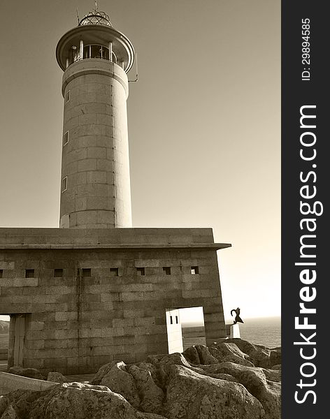 Lighthouse on the background of the sea. Lighthouse on the background of the sea