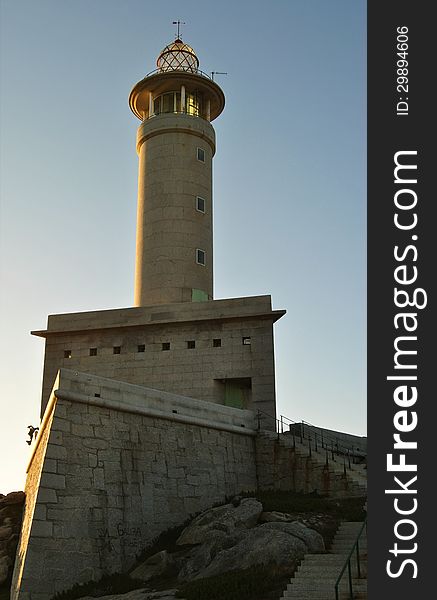 Lighthouse on the background of the sea. Lighthouse on the background of the sea