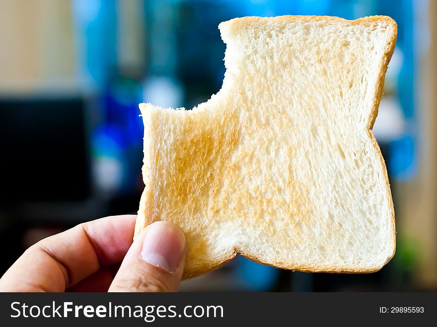 Hands Holding Toast