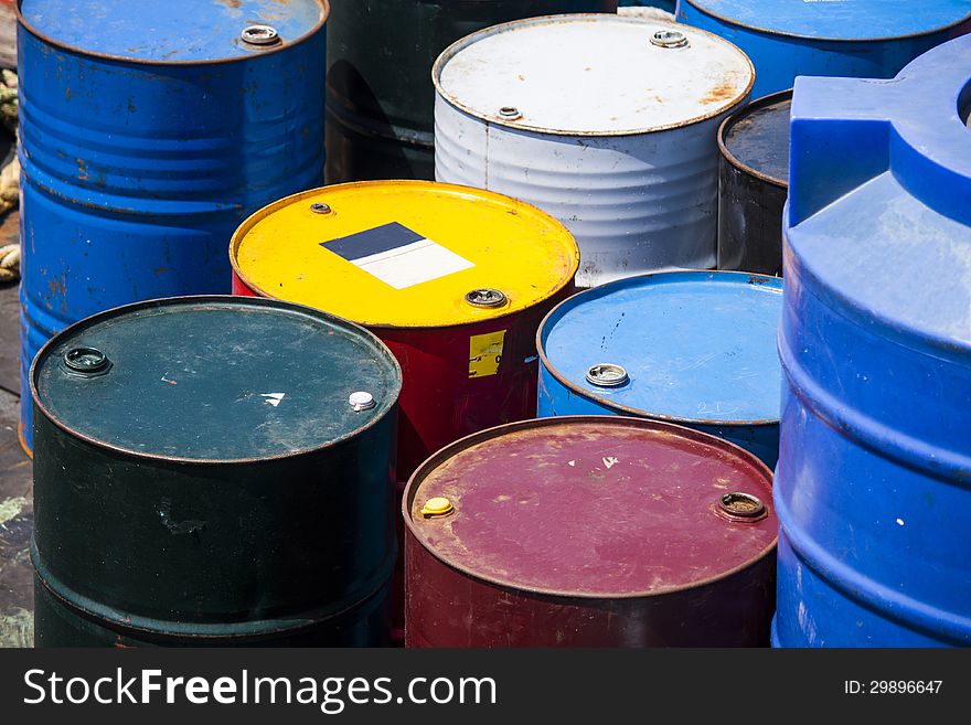Colorful oil gallon, yellow, red, blue