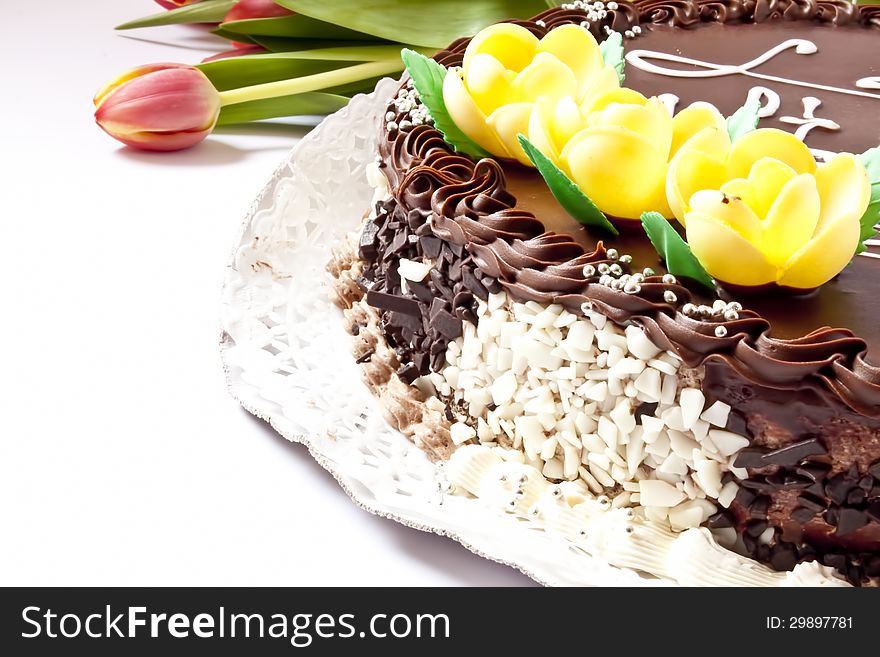 Sweet cake with chocolate and edible decoration of marzipan. Sweet cake with chocolate and edible decoration of marzipan