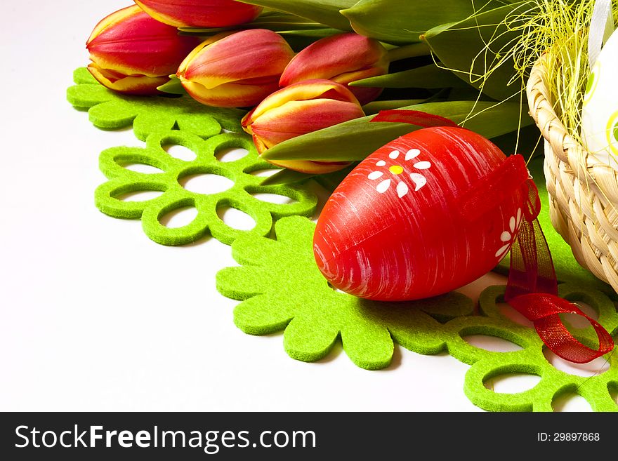 Colorful decorated easter eggs and fresh tulips. Colorful decorated easter eggs and fresh tulips