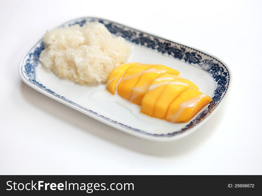 Thai dessert, Sticky Rice with Mango on white blackground