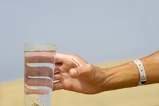 Hand Reaching For Water. Stock Images