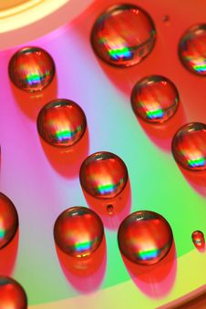 Red Water Drop On Disk Stock Photos Red Water Drop On Disk Stock Photos