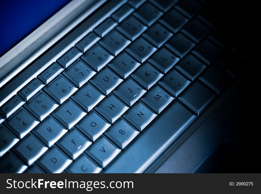 Macro shot of a laptop keyboard.