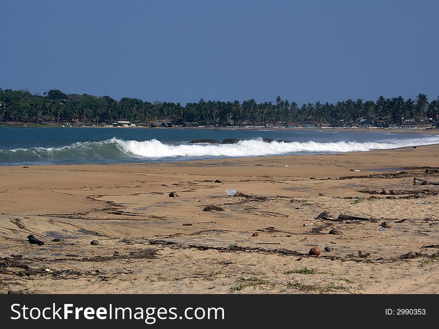 Wave on the beach Aguram Bay in Sri Lanka