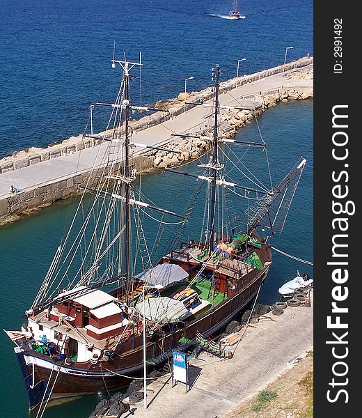 Kyrenia Marina, full of yachts and fishing boats, is framed by the colossal hulk of its Crusader castle. With the backdrop of the jagged mountains behind and the calm sparkling sea in front, the harbour has an intoxicatedly serene atmosphere. Kyrenia Marina, full of yachts and fishing boats, is framed by the colossal hulk of its Crusader castle. With the backdrop of the jagged mountains behind and the calm sparkling sea in front, the harbour has an intoxicatedly serene atmosphere.