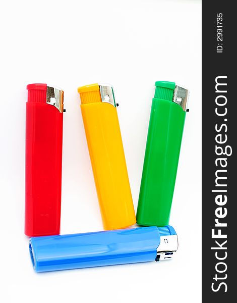 Four cigarette lighter on white background