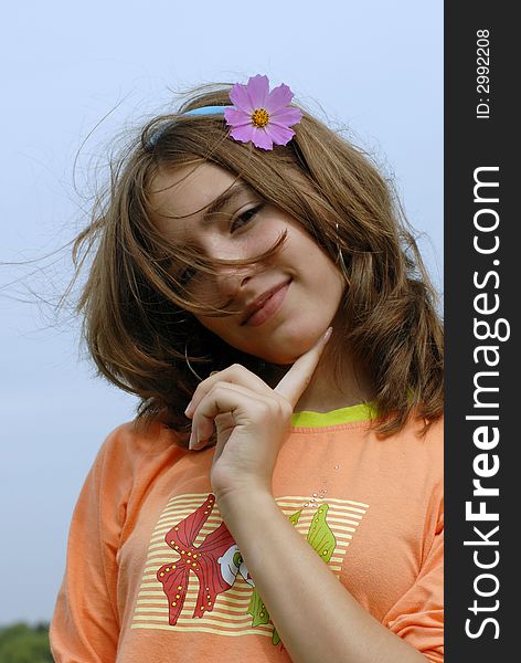 Girl with flower in a hair