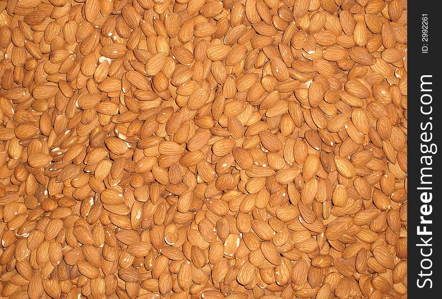 Background from appetizer brown almonds