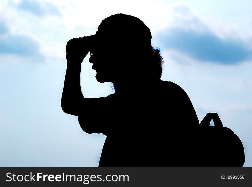An image of tourist on background of sky. An image of tourist on background of sky