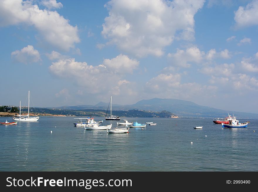 Boat and yachts anchored at the coast of Koroni, Messinia area, Greece. Boat and yachts anchored at the coast of Koroni, Messinia area, Greece