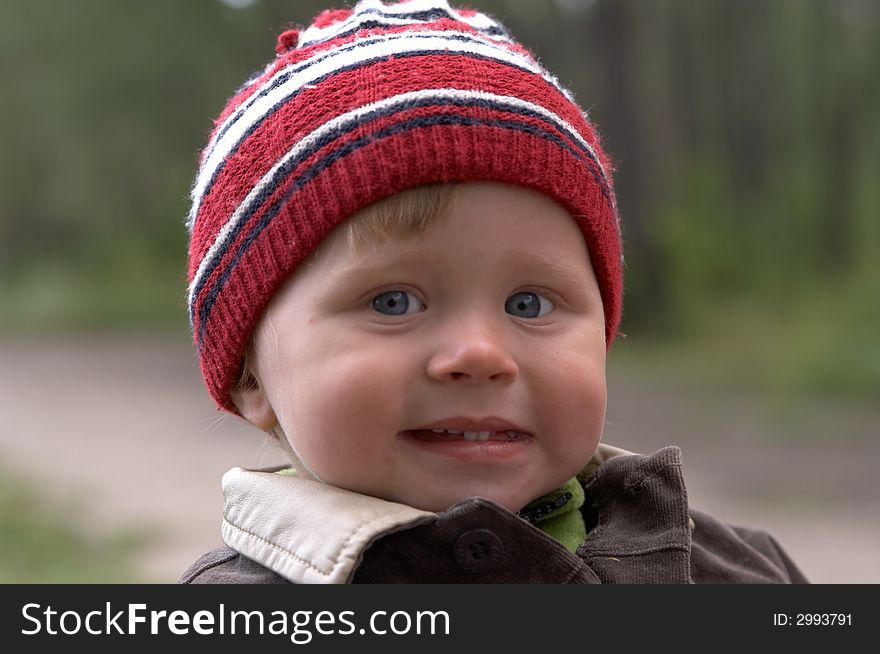 Portrait of the lovely child on fresh air