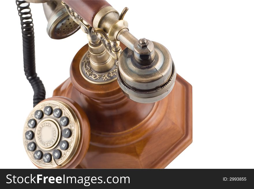 Close-up of retro-styled phone`s metallic handset isolated on white