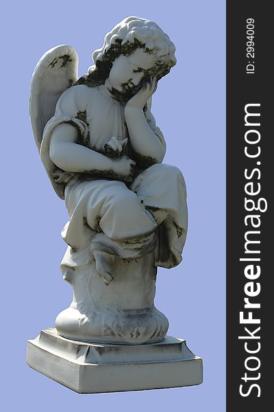 A sculpture of an marble angel sitting on the column. A sculpture of an marble angel sitting on the column