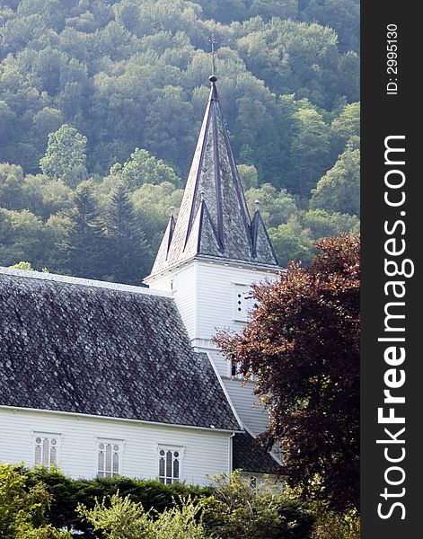 Norwegian church on hill.