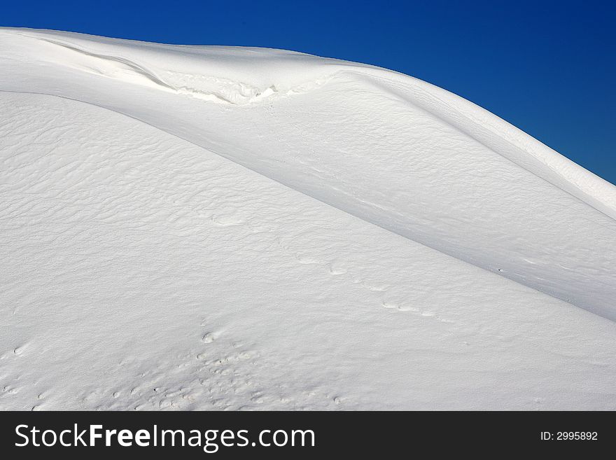 A small mountain created by fresh snow. A small mountain created by fresh snow