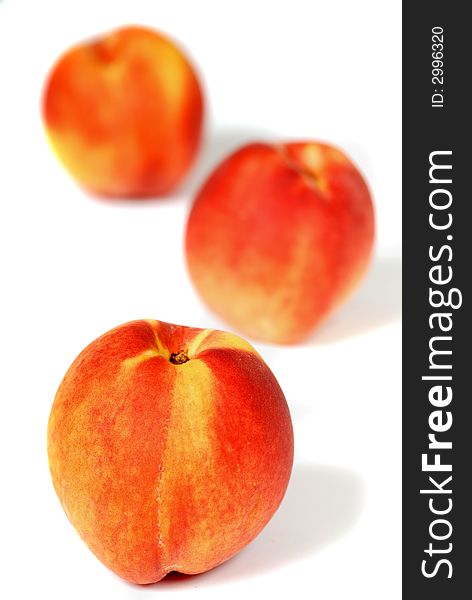 Three peaches, shallow DOF
