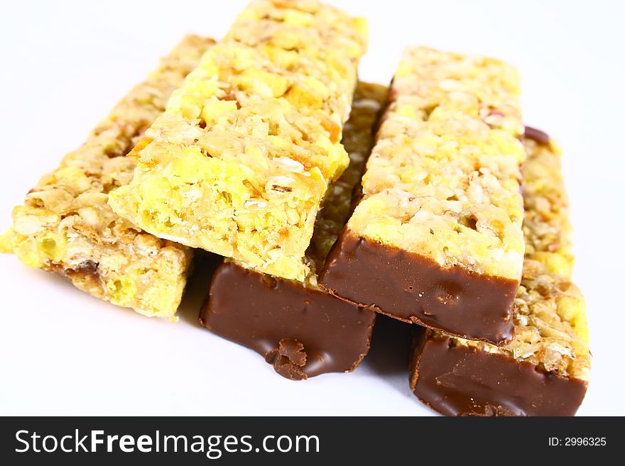 Muesli stick on white background and nutrition