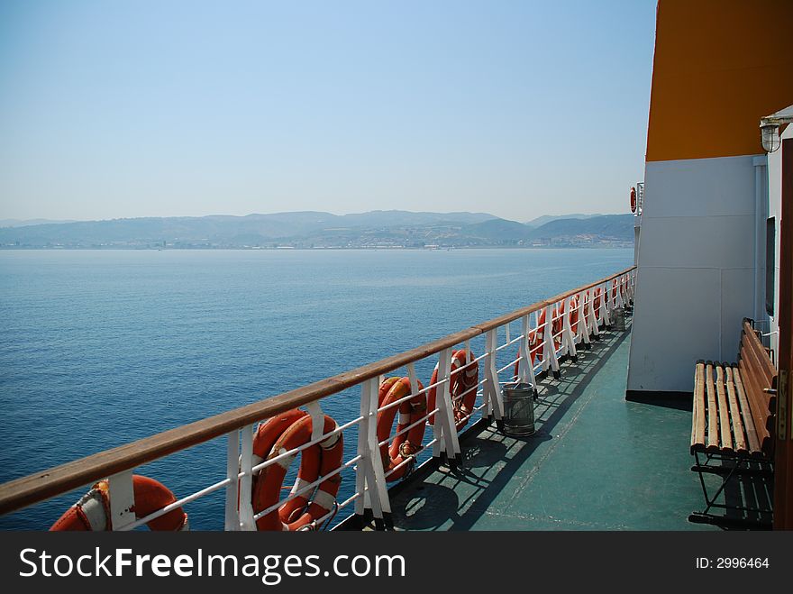 Deck of a ship carrying cars and passengers. Deck of a ship carrying cars and passengers