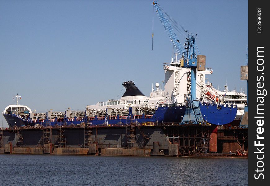 Vessel docked in a floating dock. Vessel docked in a floating dock