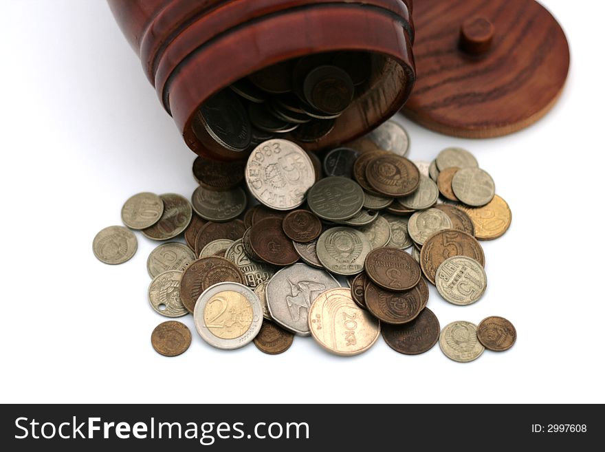 Some coins of different countries in the barrel. Some coins of different countries in the barrel