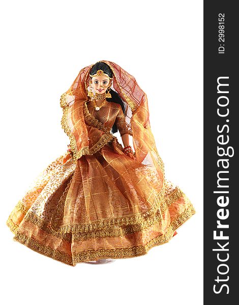 Female doll from India on a white background