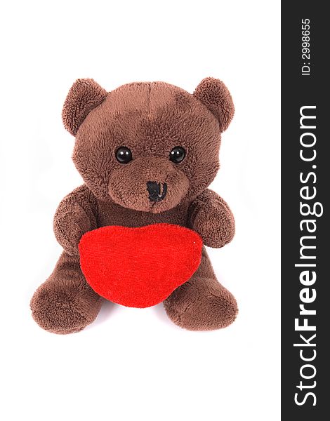 Toy bear with heart on the white background. Toy bear with heart on the white background