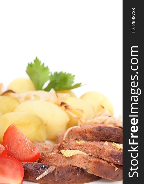 Meat and potatoes on the white background