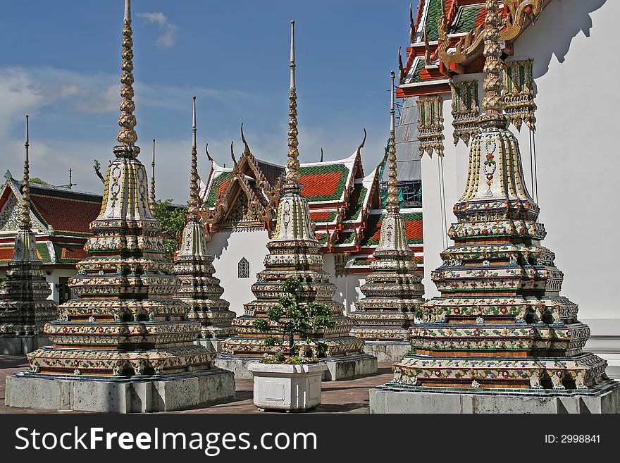 Chedis in the grounds of the Grand Palace in Bangkok. Chedis in the grounds of the Grand Palace in Bangkok