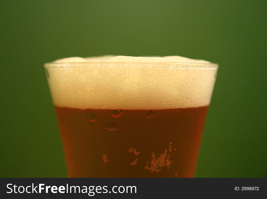 Drinking time... cold beer in summer time, focus on beer froth,. Drinking time... cold beer in summer time, focus on beer froth,
