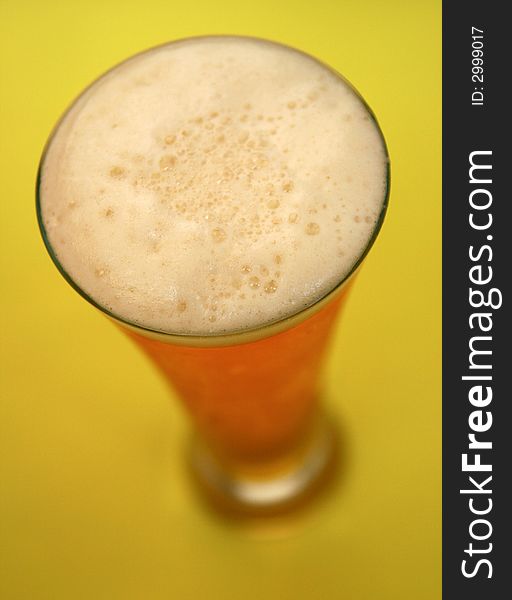 Drinking time... cold beer in summer time, focus on beer froth,. Drinking time... cold beer in summer time, focus on beer froth,