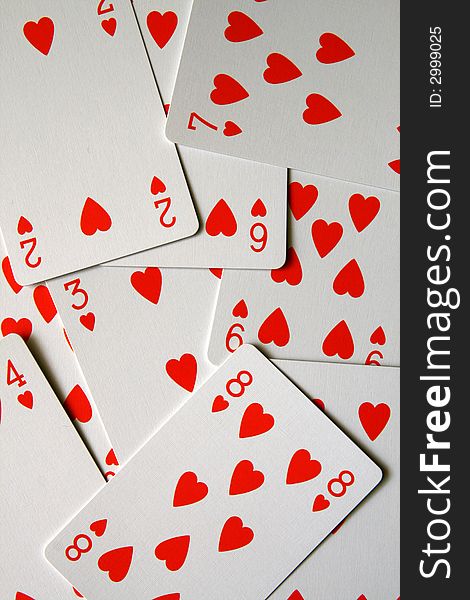 Cards texture - only hearts, scattered cards, deck of cards background,