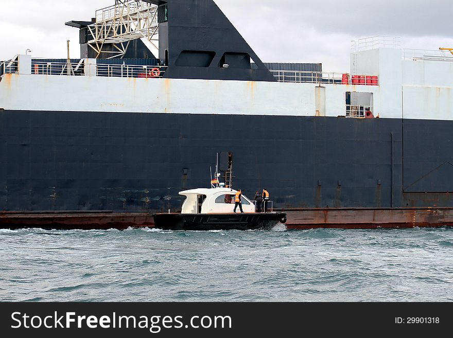 General cargo ship and pilot cutter