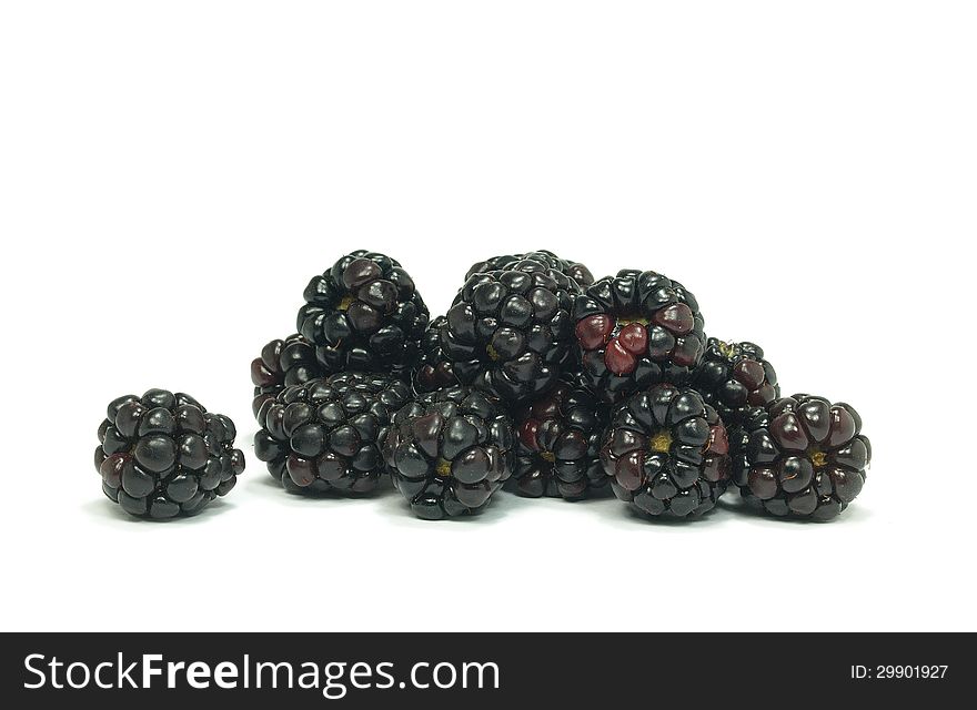 Pile of ripe blackberries on white background. Pile of ripe blackberries on white background