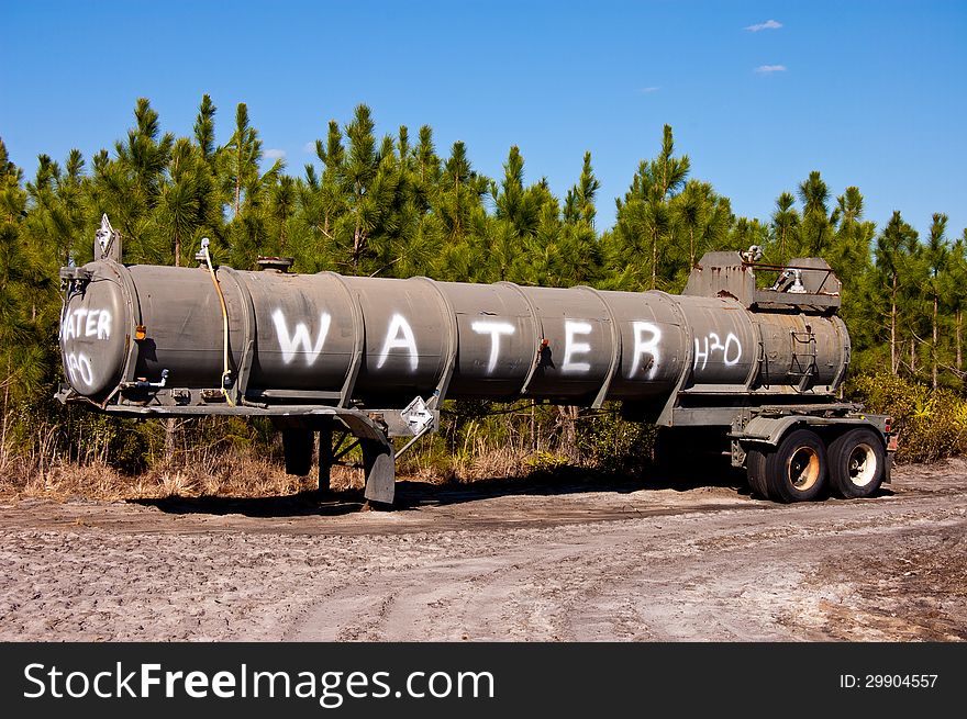 Water tender being used for logging.