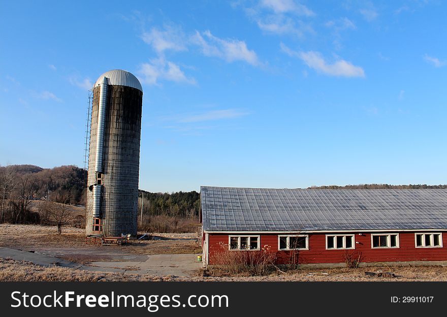 Old Silo And Red Barns