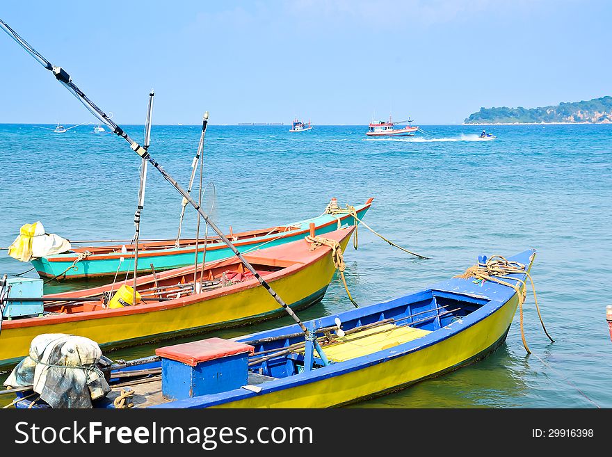 Small colorful fishing boat on the sea